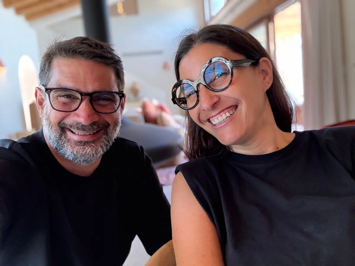 Jean Clauteaux and Jessica Bataille smiling together at home